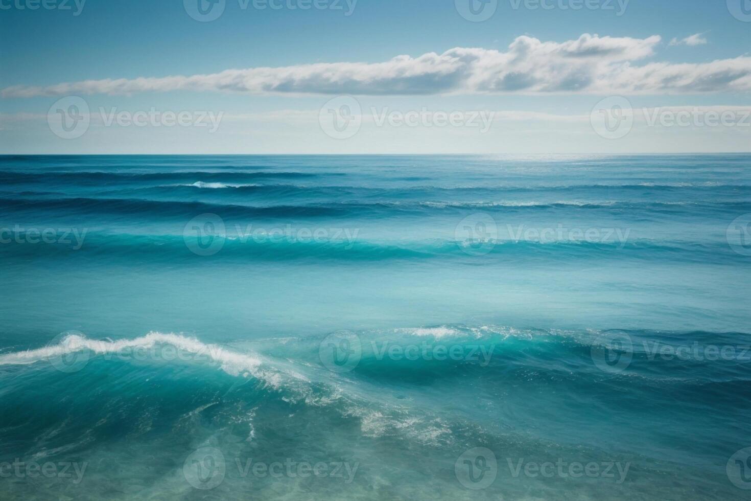 blue ocean waves and sun rays in the ocean photo