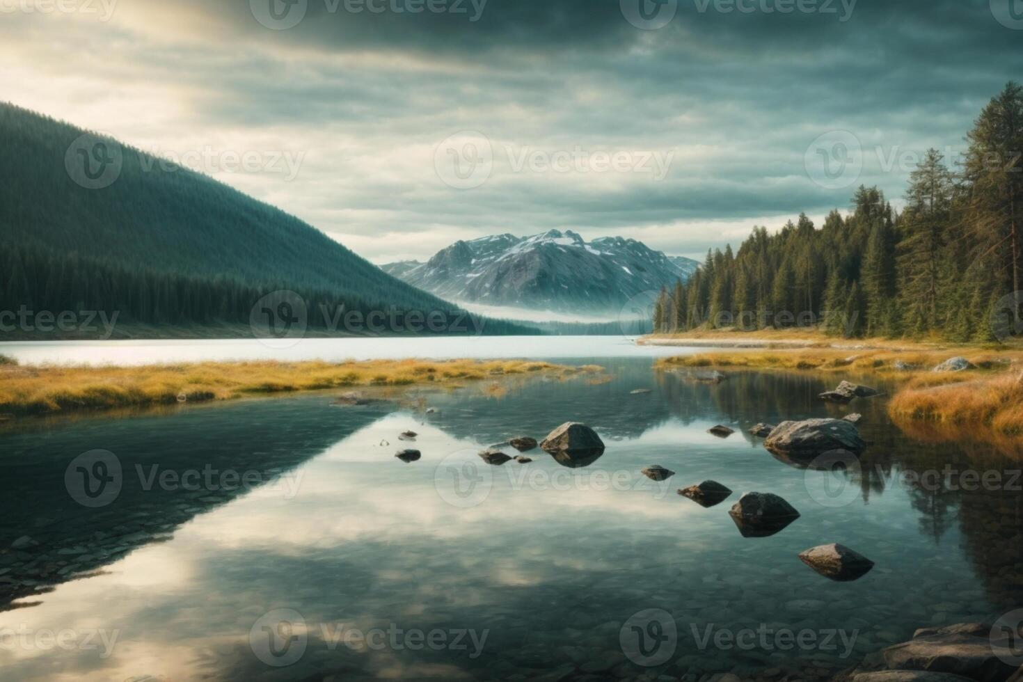 a lake surrounded by trees and rocks photo