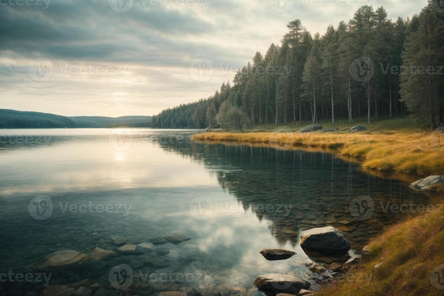 a beautiful lake surrounded by trees and rocks photo