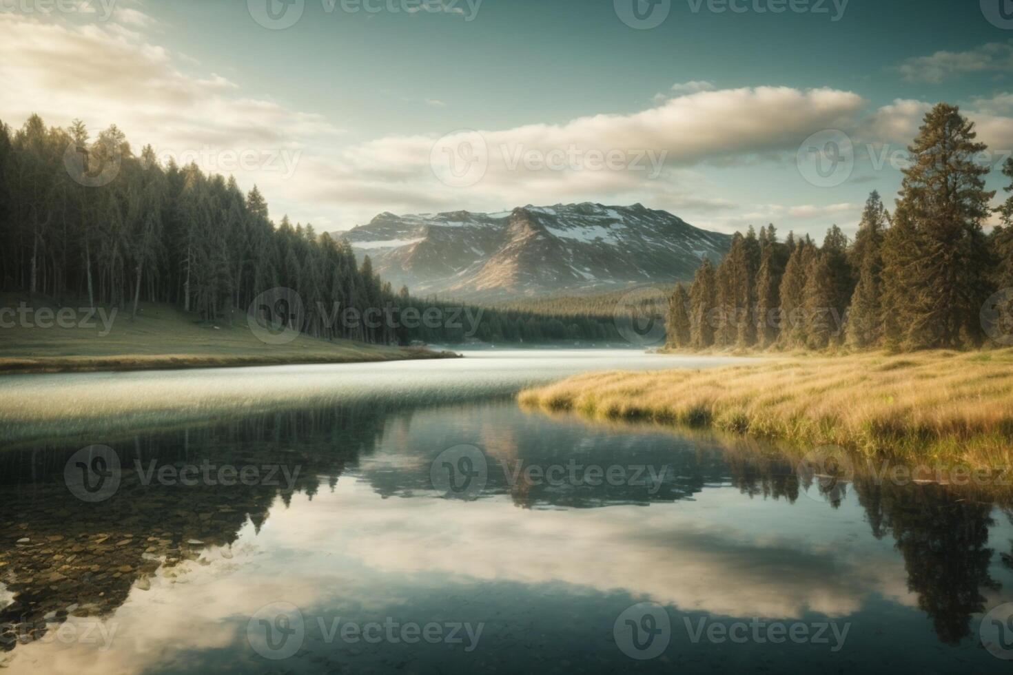 un lago rodeado por arboles y un puesta de sol foto