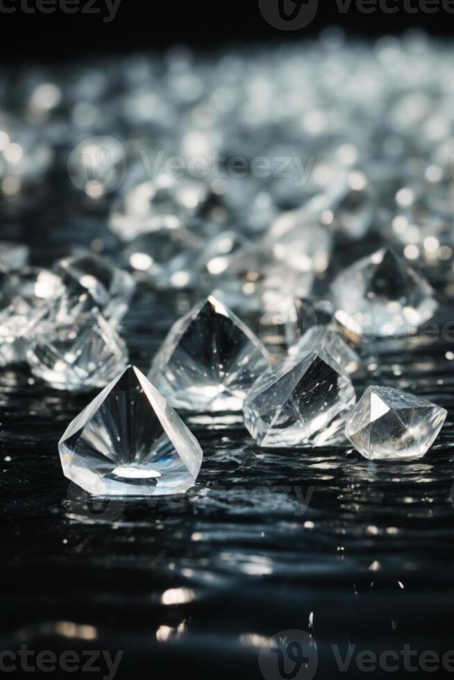 diamonds on a black surface with water photo