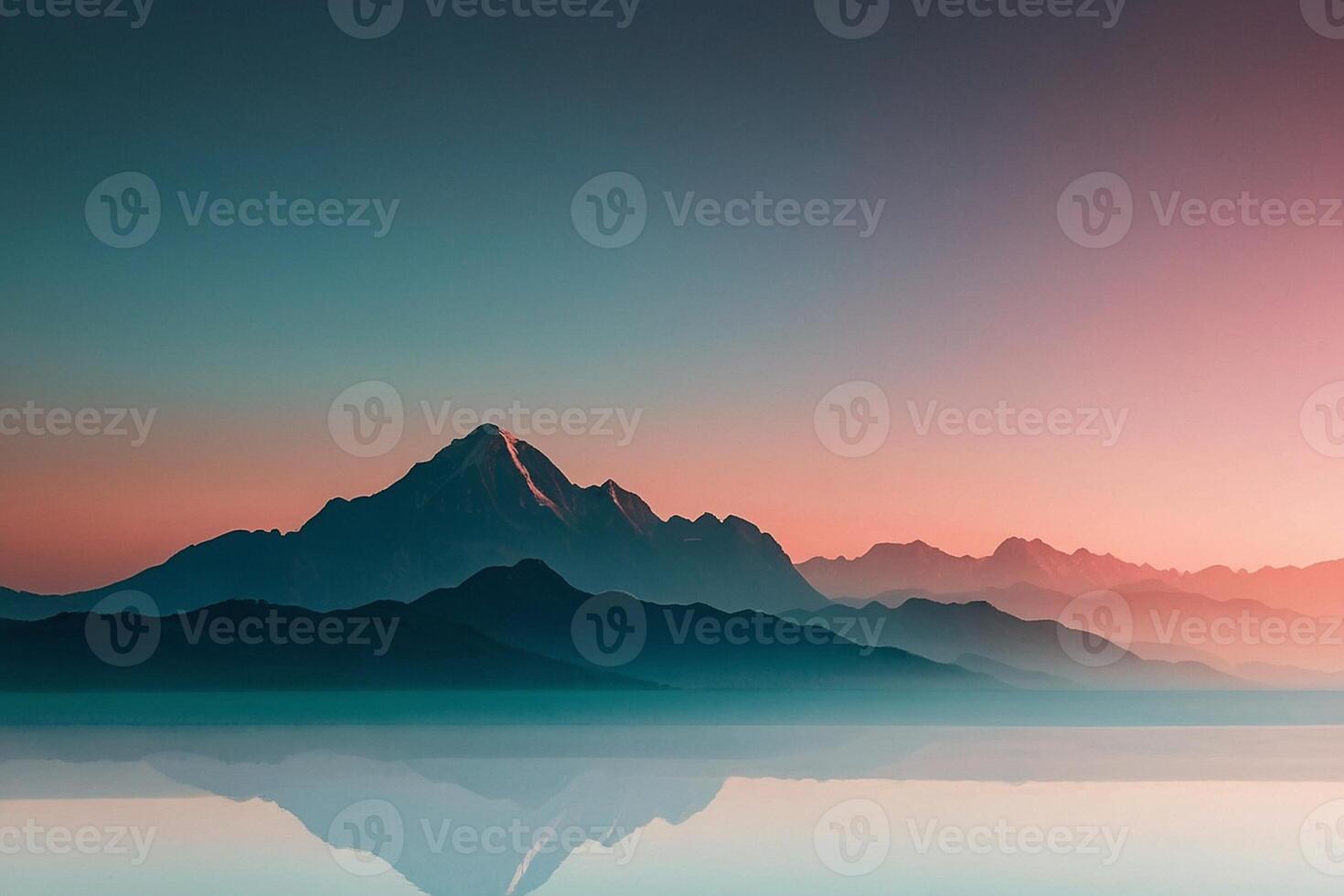 a mountain range with a sunset in the background photo