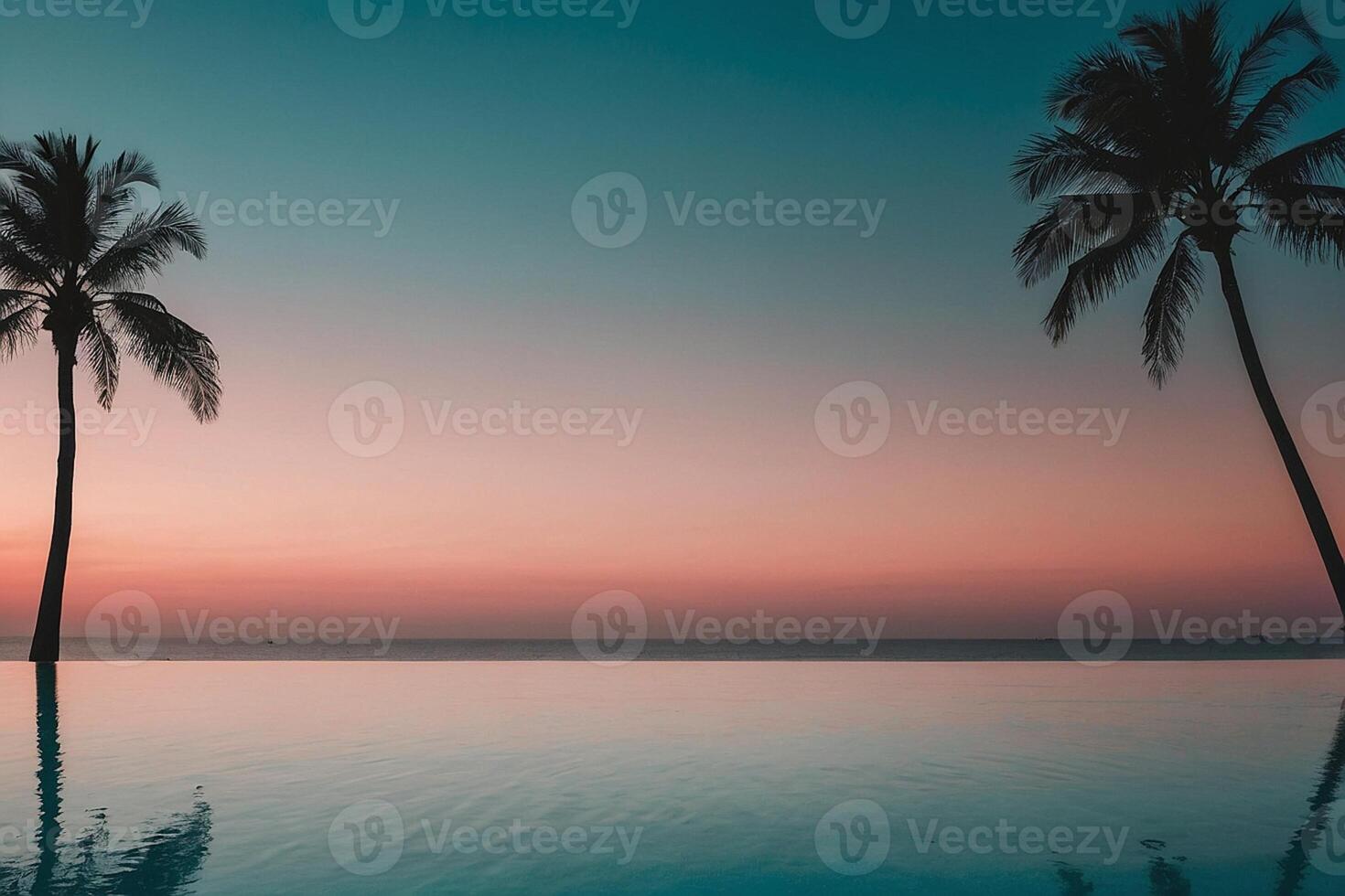 two palm trees stand in the middle of a pool at sunset photo