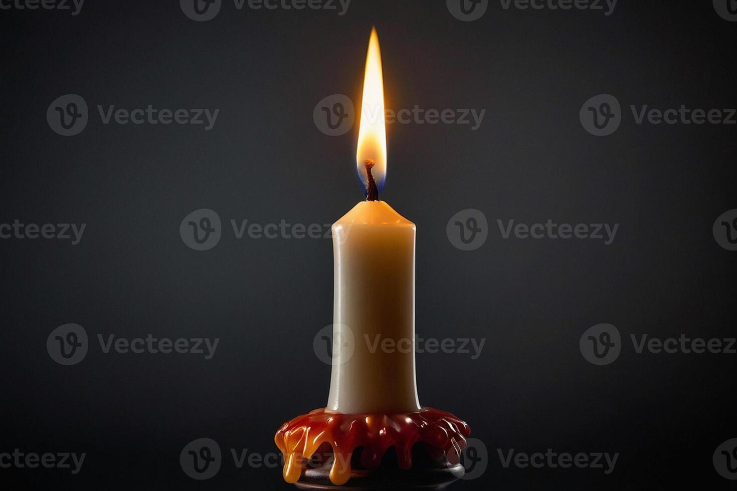 candle with burning candle on black background photo