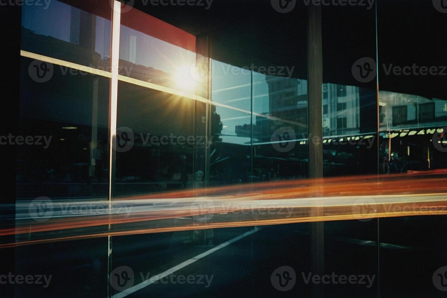 a long exposure photograph of a car driving through a city photo