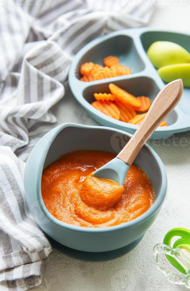 Healthy baby food in bowl. photo