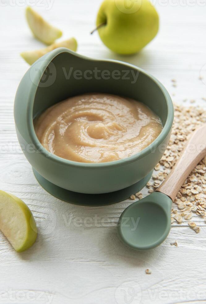 A bowl of porridge for baby. photo