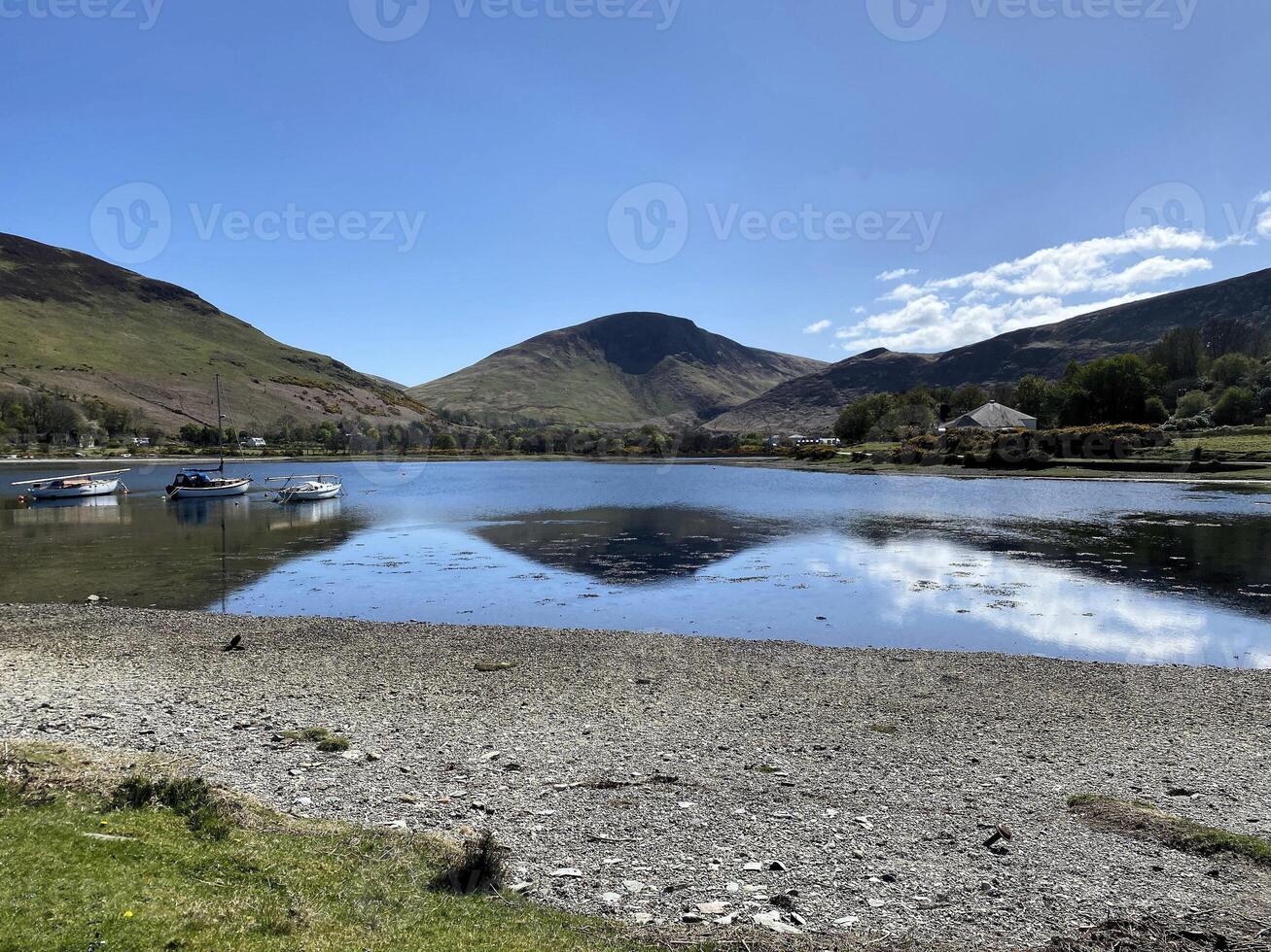 A view of the Isle of Arran in Scotland on a sunny day photo