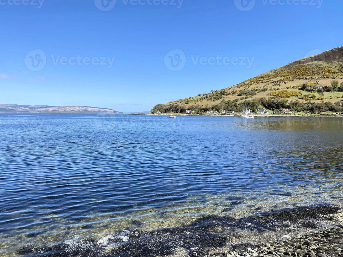 A view of the Isle of Arran in Scotland on a sunny day photo