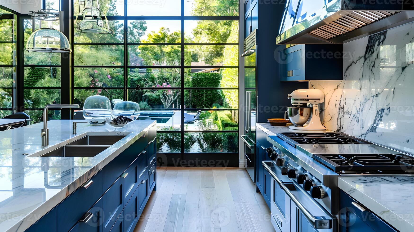 Elegant Los Angeles Home Kitchen with Dark Blue Cabinets and Marble Countertops overlooking a Beautiful Backyard photo