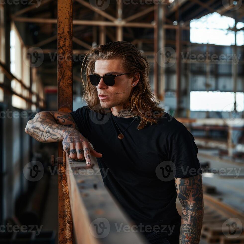 Black Tshirt mockup, featuring a rebel look male model photo