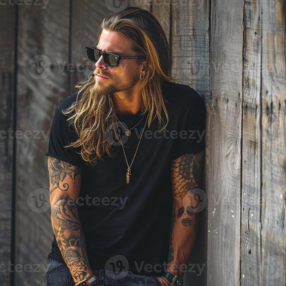 Black Tshirt mockup, featuring a rebel look male model photo