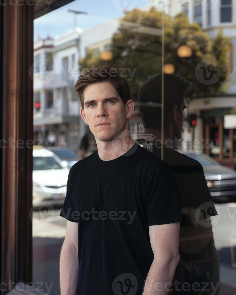 Young Caucasian Adult in Blank Black T Shirt photo