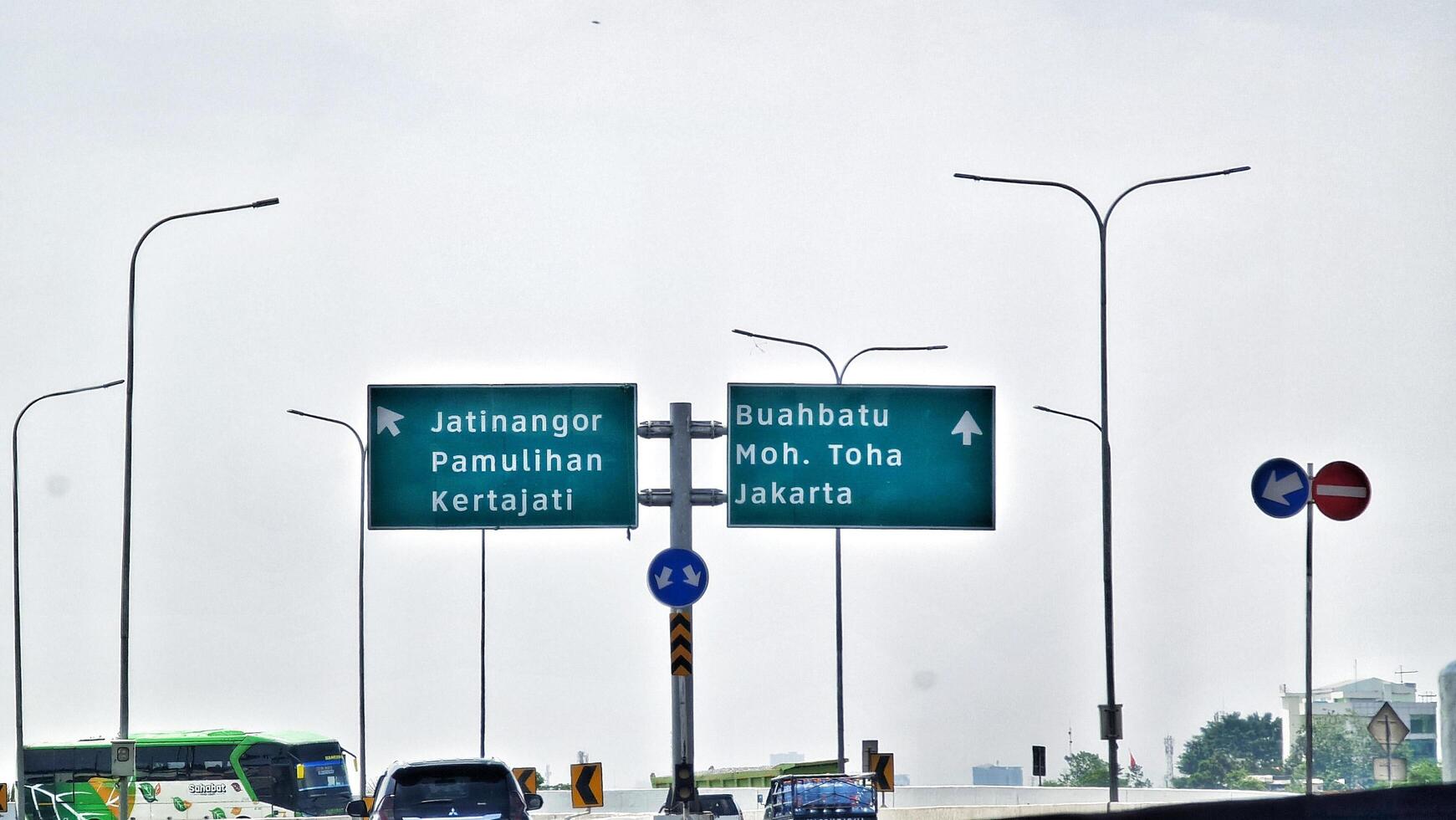 Bandung, Indonesia on December 20, 2023. A butterfly sign at the toll road intersection towards Jatinangor Pamulihan Kertajati and Buah Batu Moh Toha Jakarta. photo