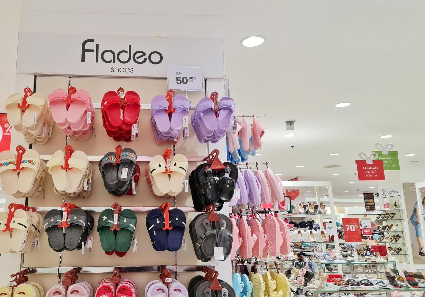 Jakarta, Indonesia on December 21 2023. Fladeo brand sandals on display for sale at a Matahari Department Store. photo