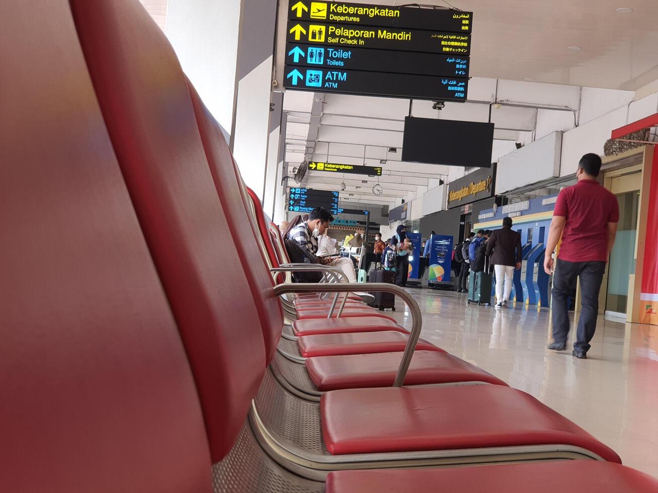 Jakarta, Indonesia on July 7 2022. The atmosphere of the waiting room at Halim Perdana Kusuma Airport photo