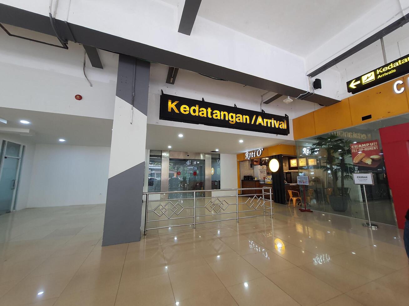 Jakarta, Indonesia on July 7 2022. The atmosphere from the exit of the Arrival section of Halim Perdanakusuma Airport, you can see passengers entering and officers standing guard. photo