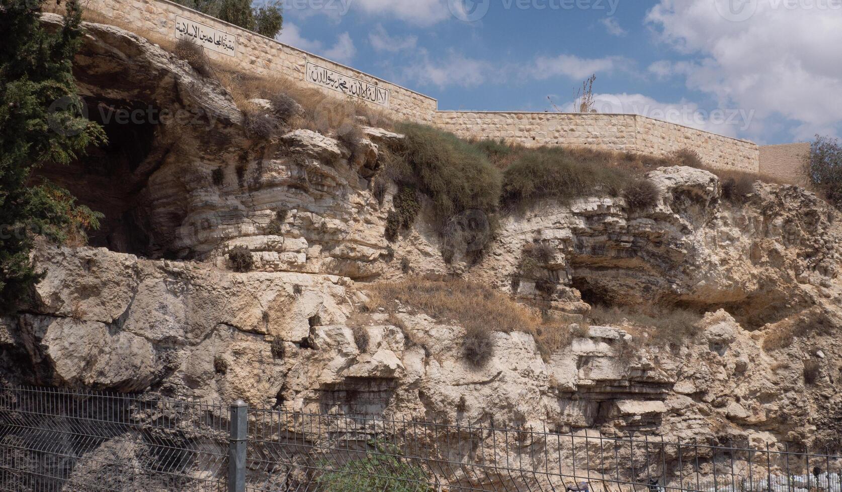 Skull Rock near Garden Tomb in Jerusalem, Israel photo