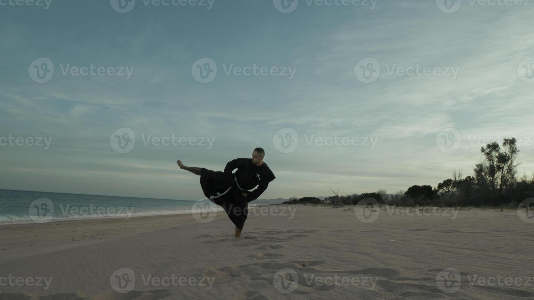 Karate Monk Closure Trains On The Beach Athlete photo