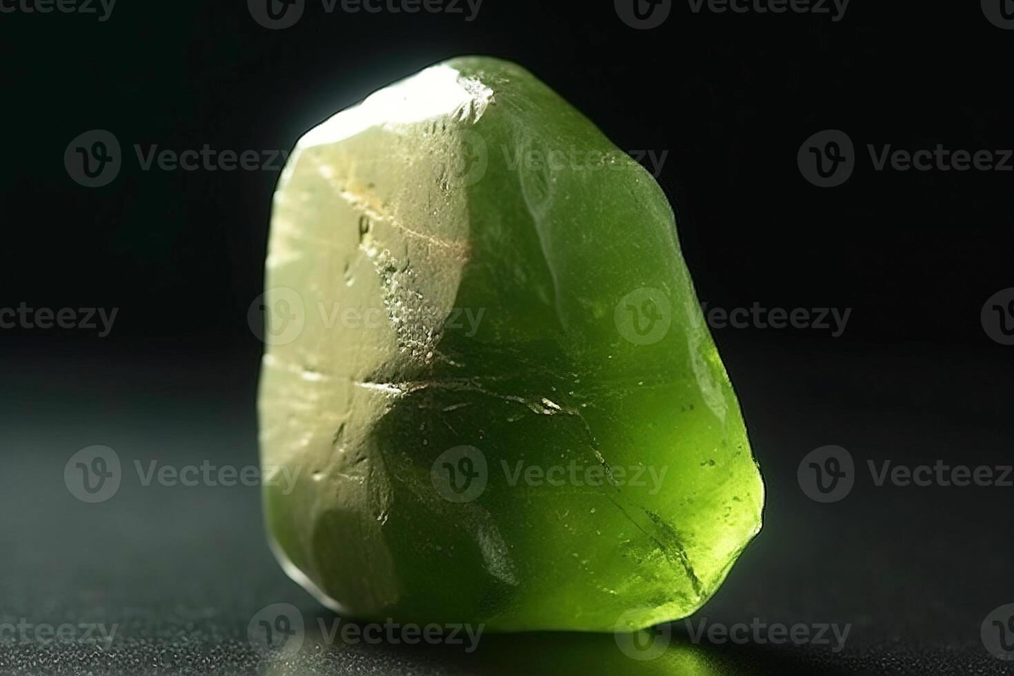 Olivine fossil mineral stone. Geological crystalline fossil. Dark background close-up. photo