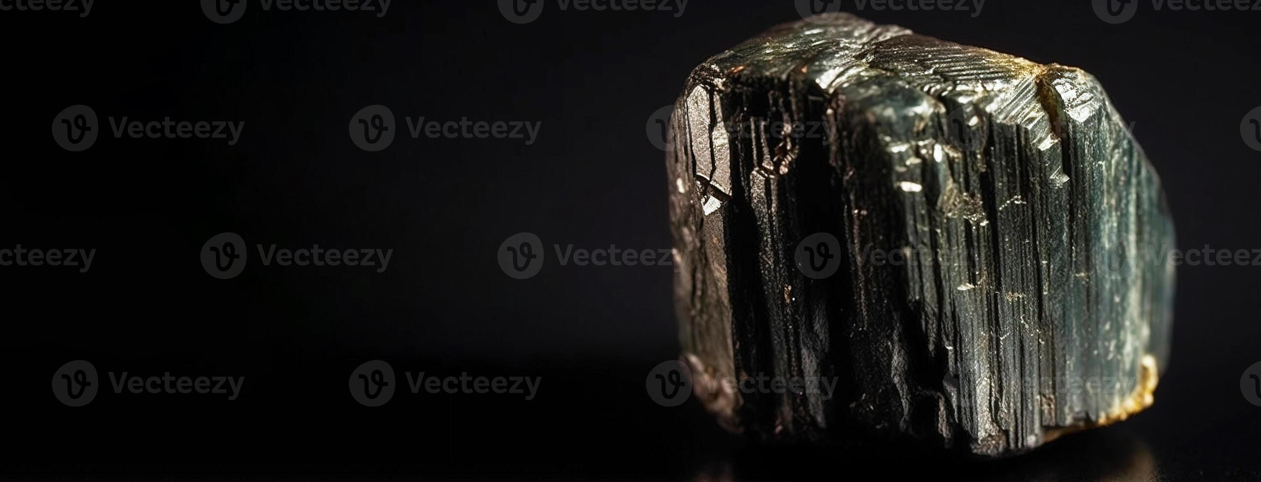 Enargite is a rare precious natural stone on a black background. . Header banner mockup with space. photo