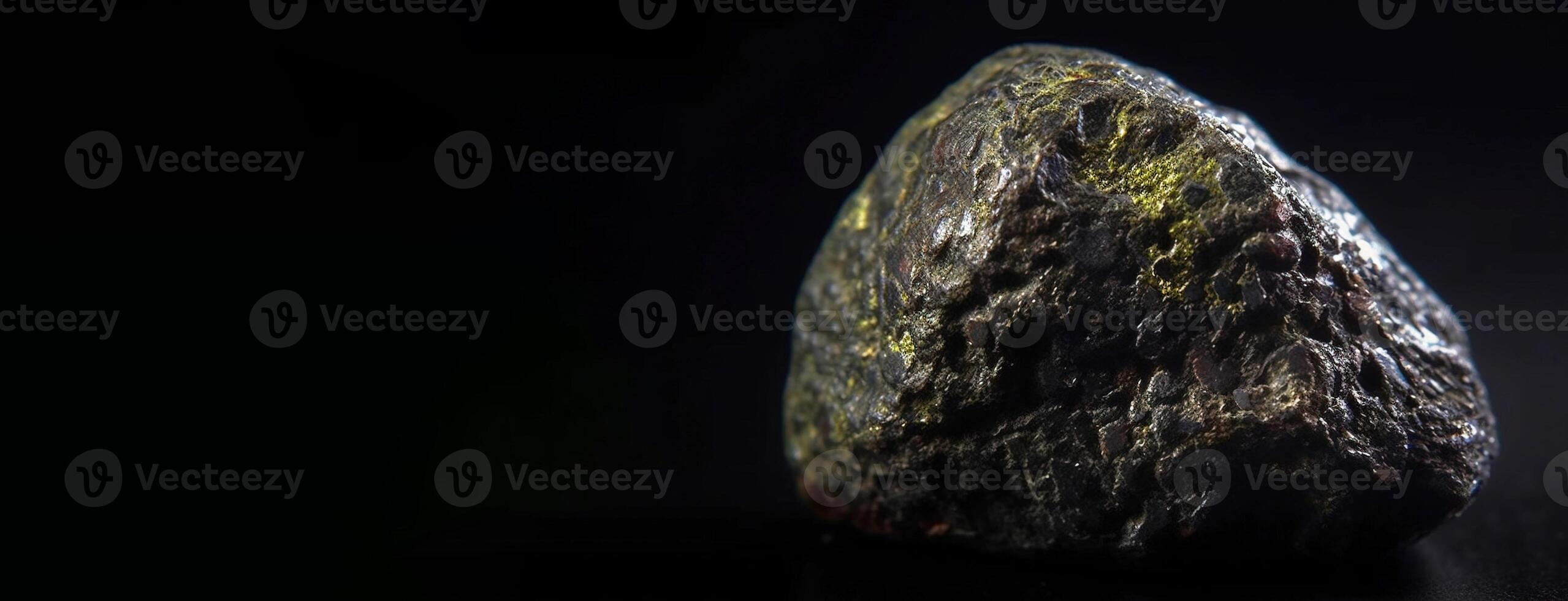 Mathesiusite fossil mineral stone. Geological crystalline fossil. Dark background close-up. photo