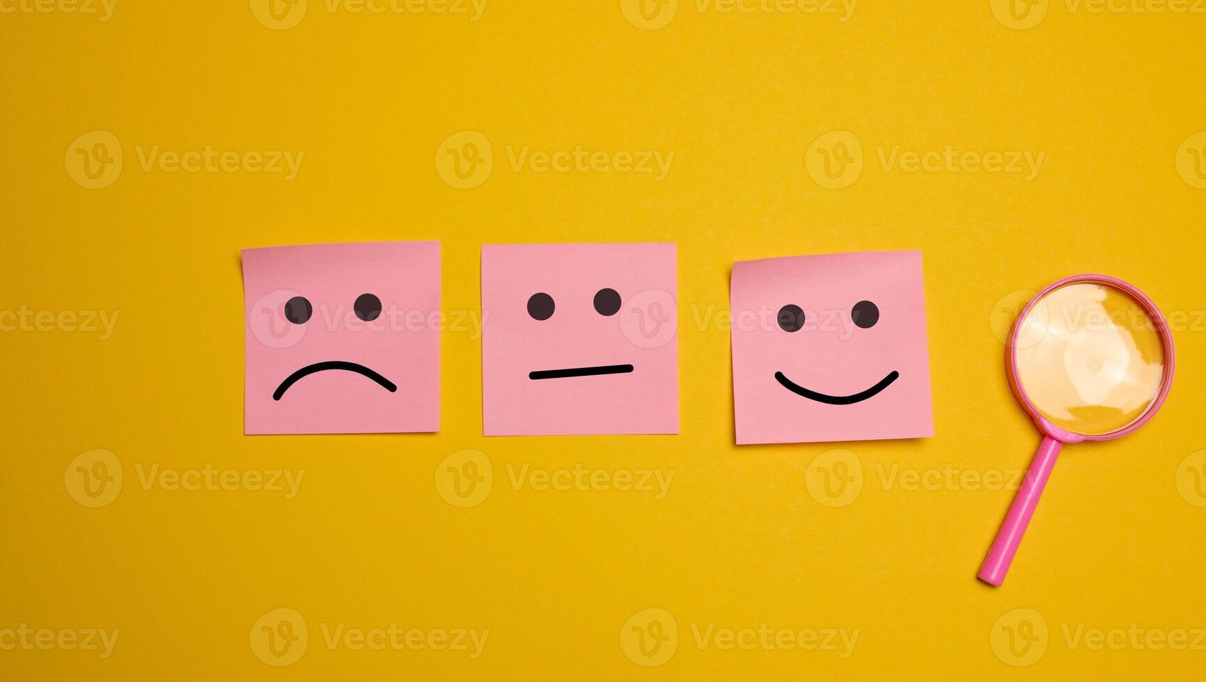 Drawn faces with different emotions on a sticker. Rating and quality assessment photo