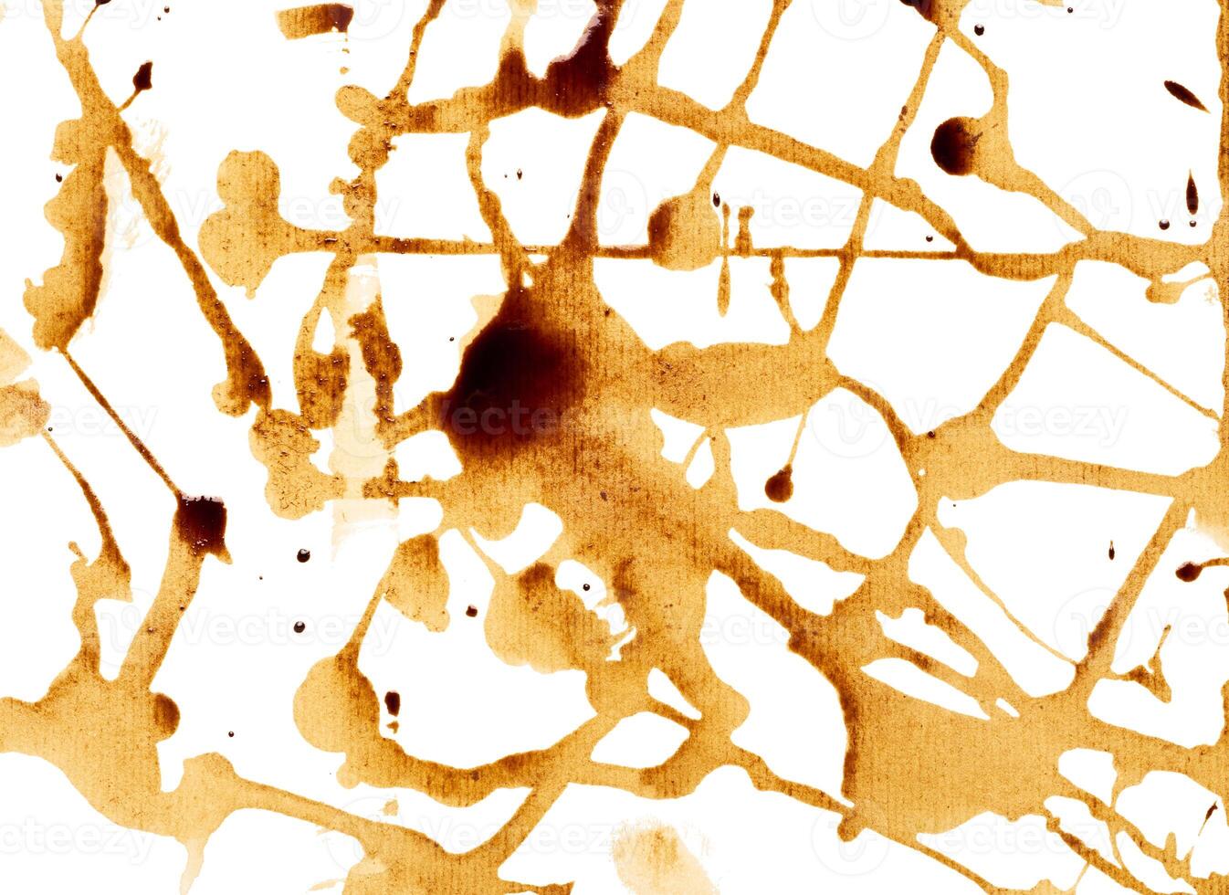 Spilled black coffee, splashes on a white background photo