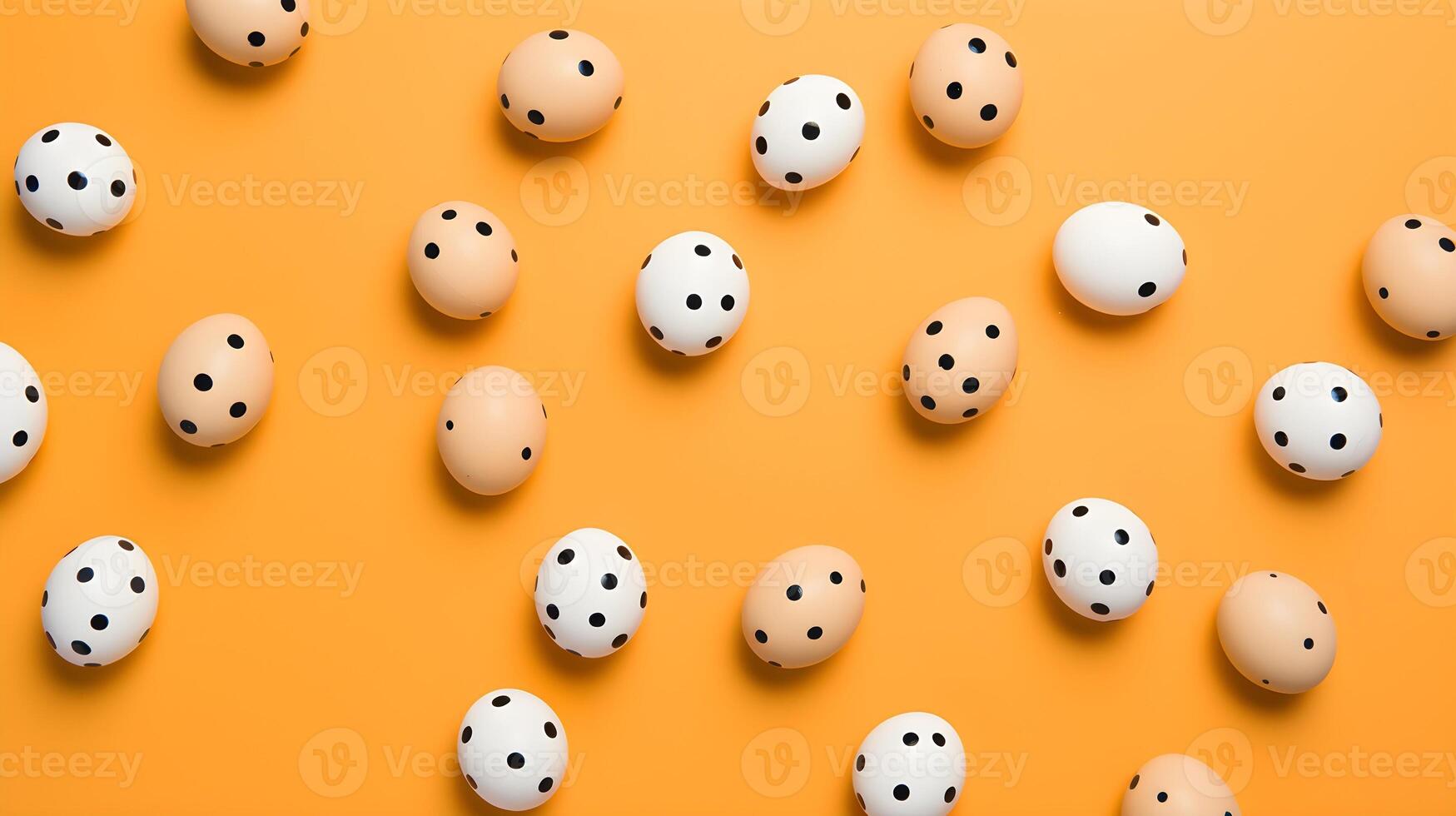 Colorful eggs with copyspace on orange background. Easter egg concept, Spring holiday photo