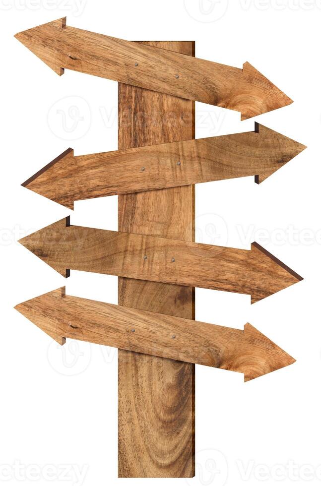 Brown wooden arrows with different directions on isolated background photo