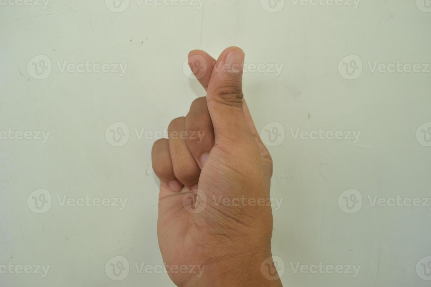 Man's hand isolated on white background. male hand gestures with various movements. Close-up of an elegant palm facing upwards with space for your product. various hand gestures photo