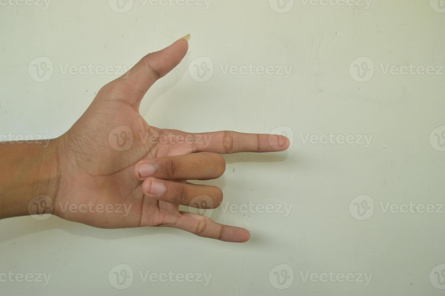 Man's hand isolated on white background. male hand gestures with various movements. Close-up of an elegant palm facing upwards with space for your product. various hand gestures photo