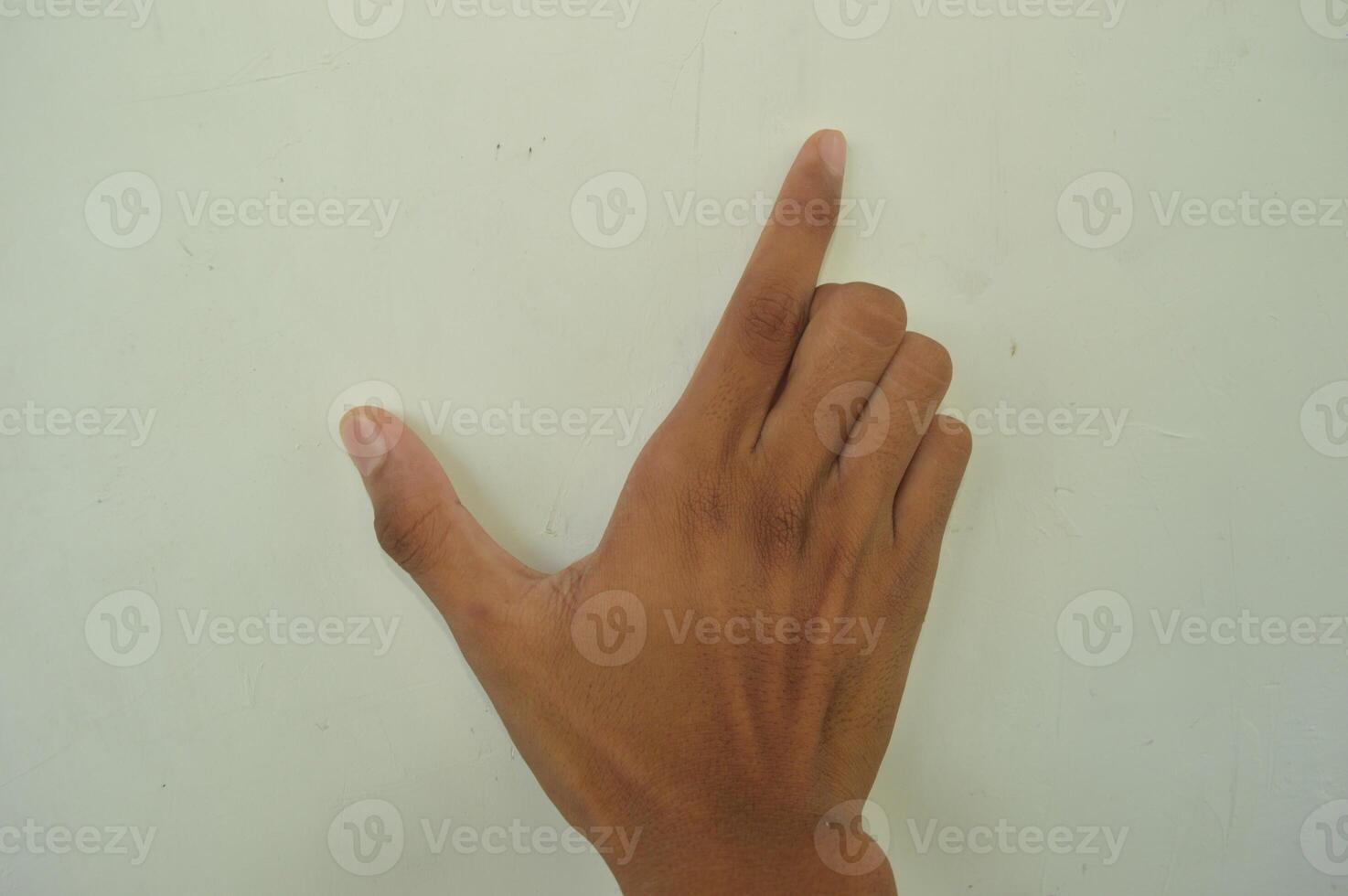 Man's hand isolated on white background. male hand gestures with various movements. Close-up of an elegant palm facing upwards with space for your product. various hand gestures photo