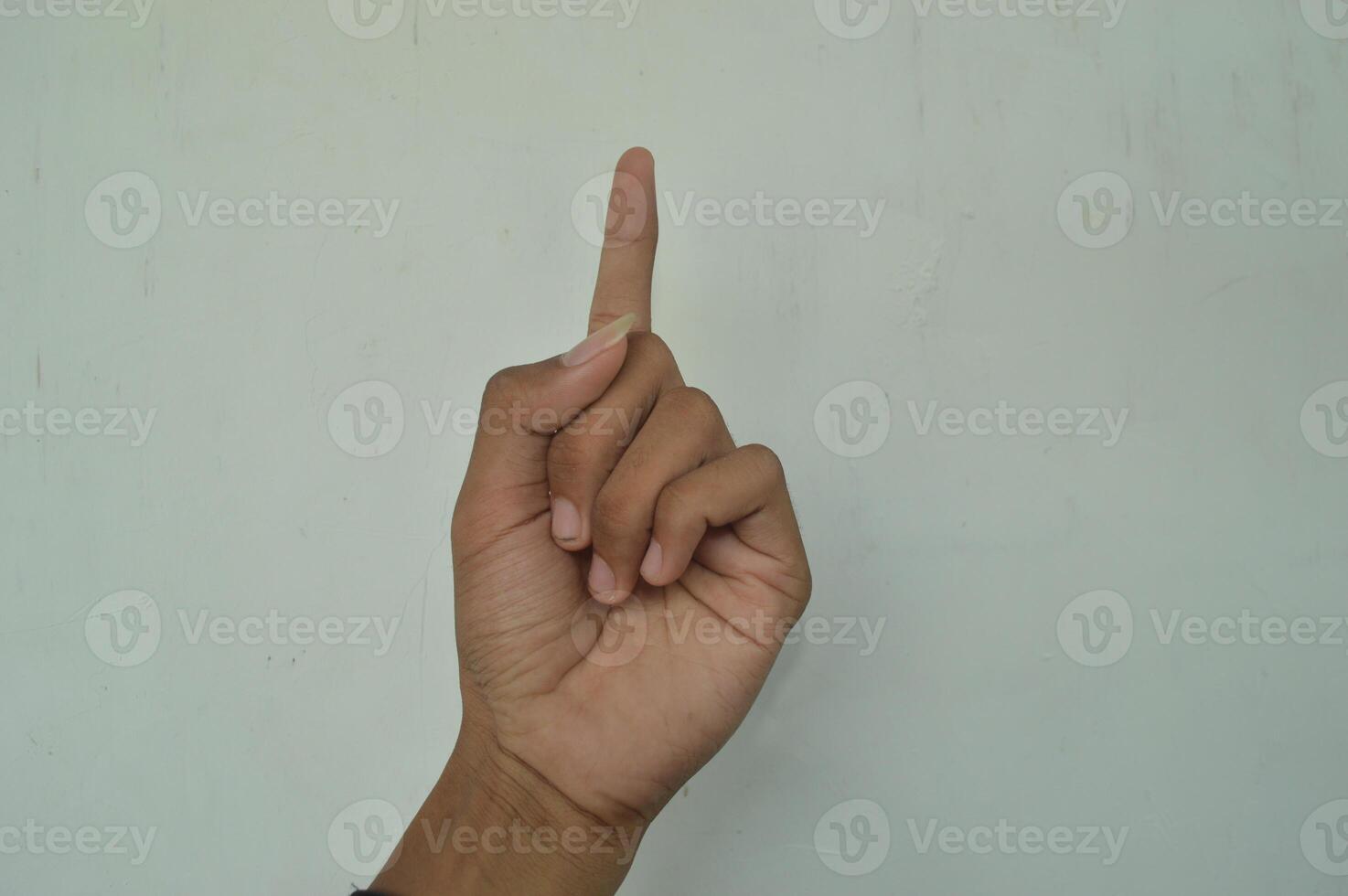 Man's hand isolated on white background. male hand gestures with various movements. Close-up of an elegant palm facing upwards with space for your product. various hand gestures photo