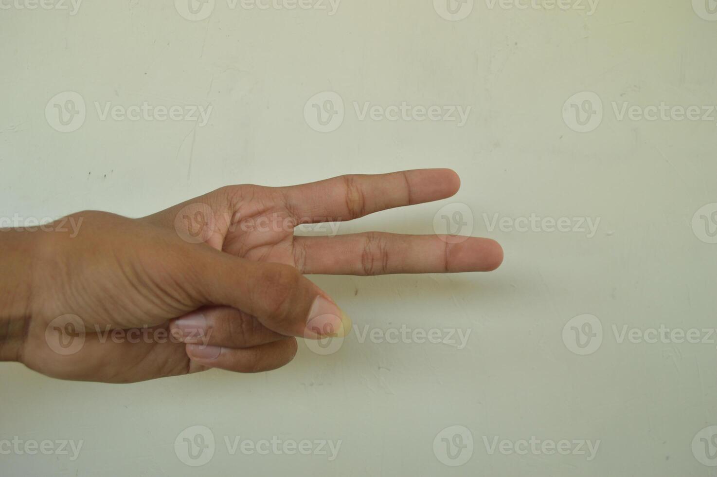 Man's hand isolated on white background. male hand gestures with various movements. Close-up of an elegant palm facing upwards with space for your product. various hand gestures photo