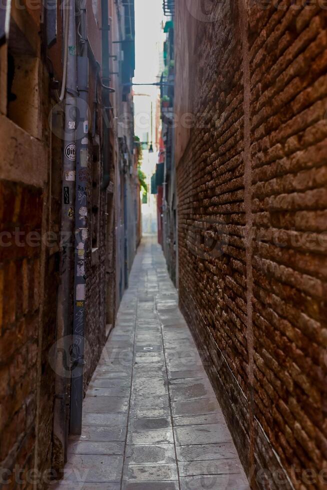 Typical Venetian architecture and street view from Venice, Italy. photo