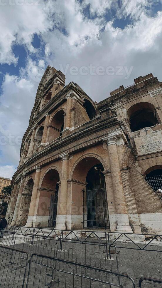 Rome. Empty Colosseum square in Rome dawn view, the most famous landmark of eternal city, capital of Italy photo