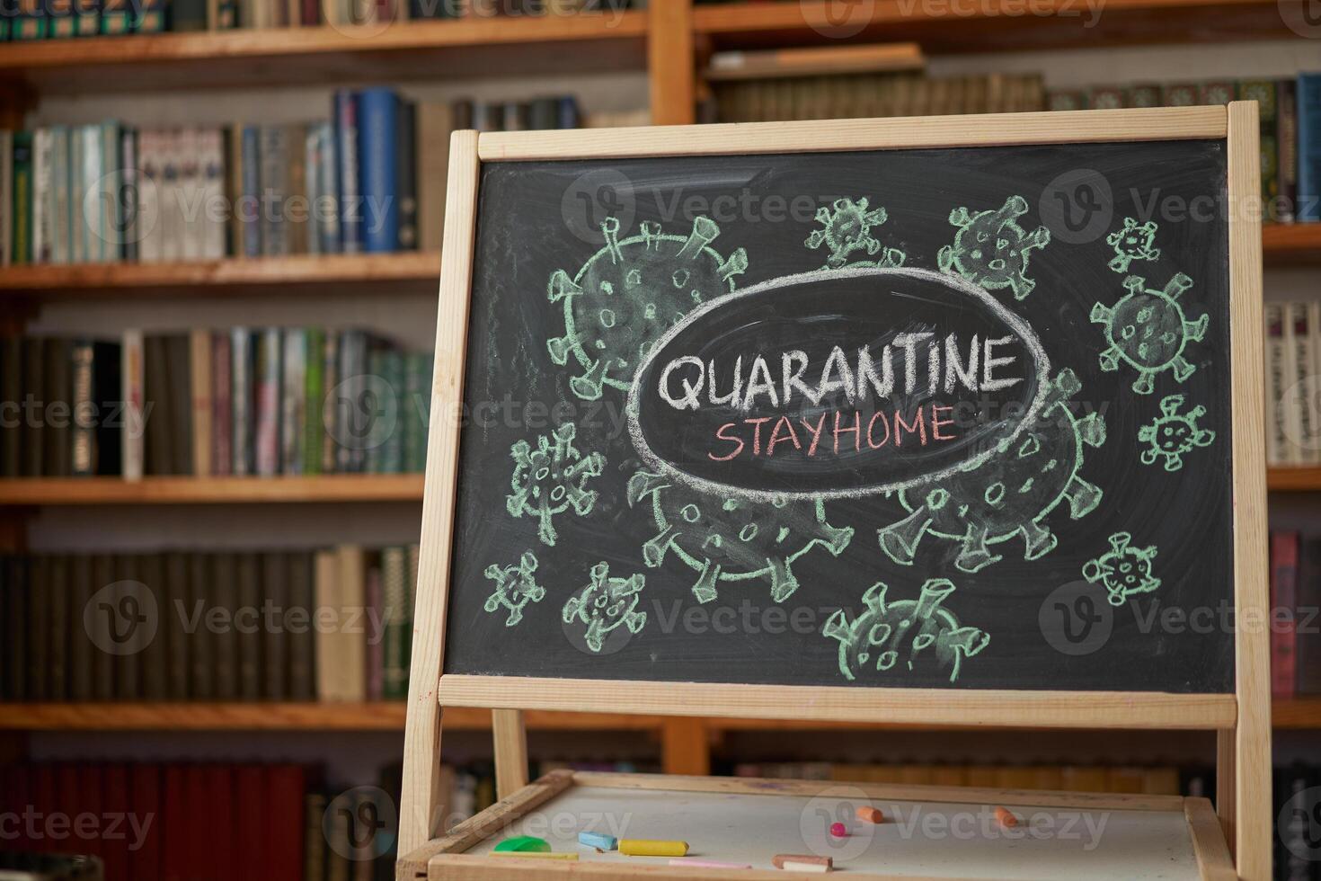 Quarantine. Outbreak Warning. written white chalk on blackboard in connection with epidemic of coronavirus worldwide. photo