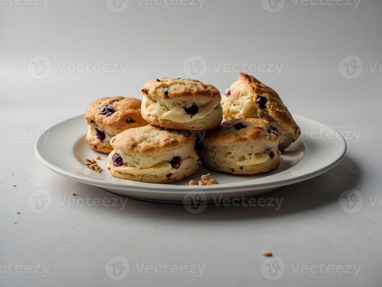 Scones with blueberries on a white plate on a white background photo