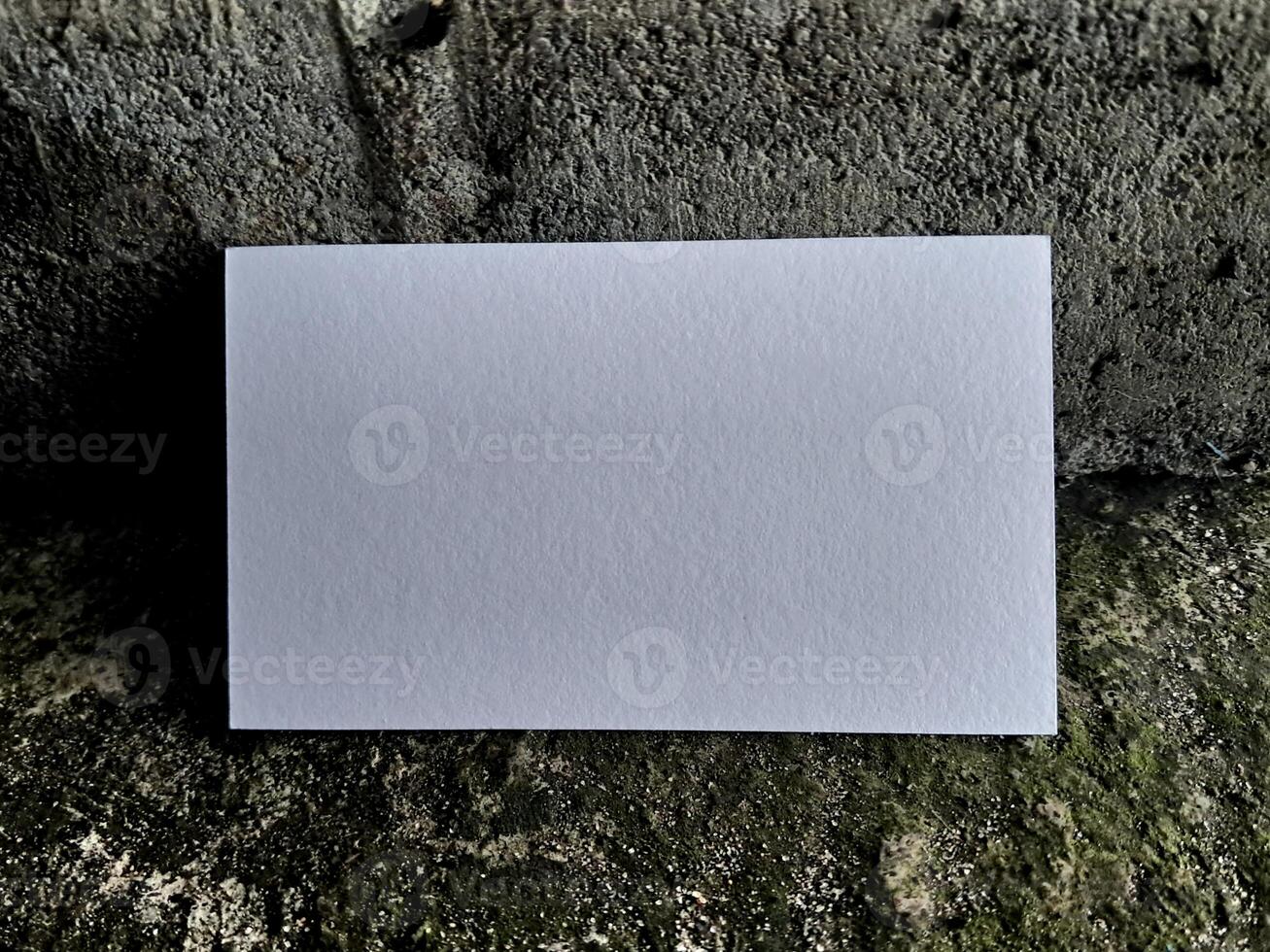 Business card white color on the floor background photo