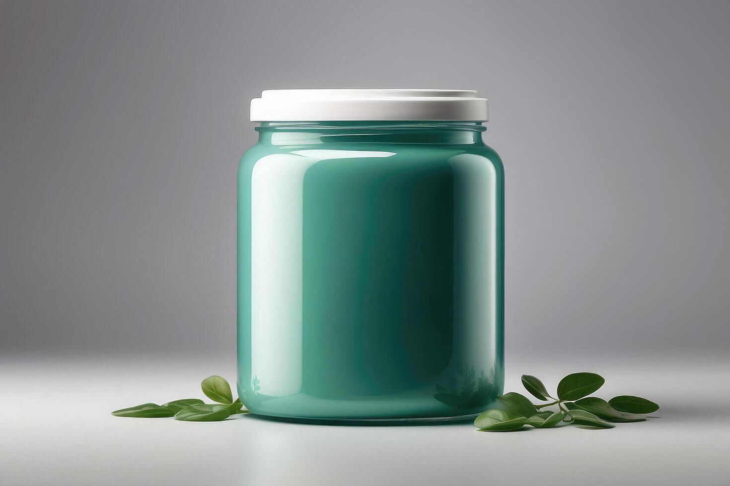 a green jar with a lid and leaves on a table photo