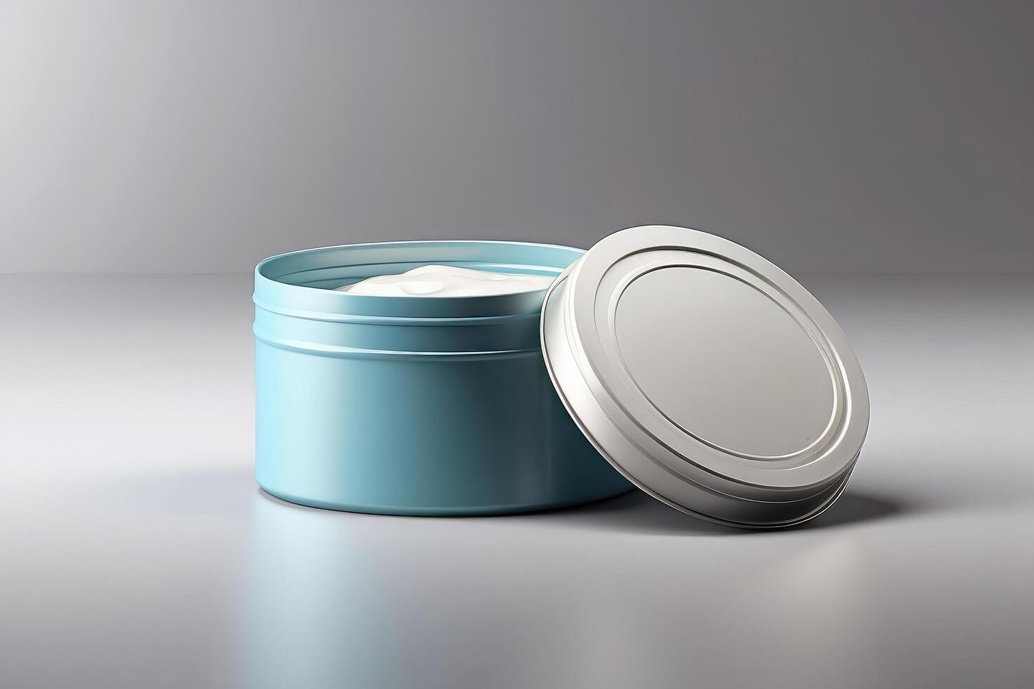 a blue container with cream inside on a white surface photo