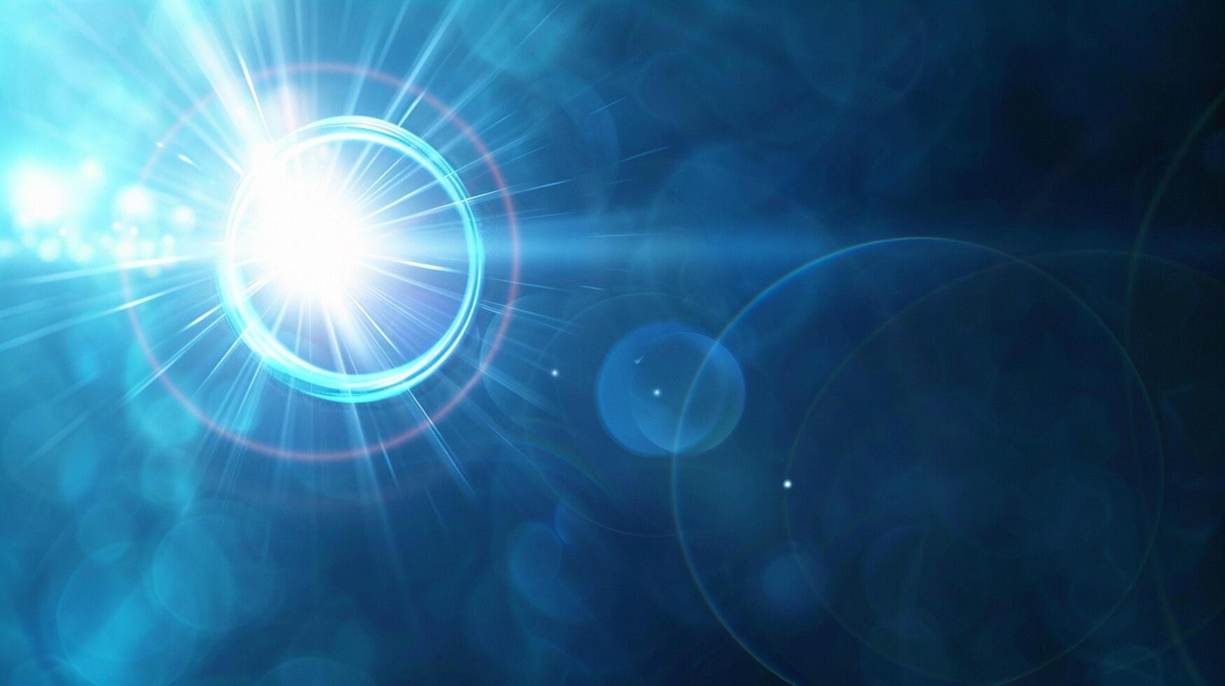 abstract blue lens flare with ring ghost design photo