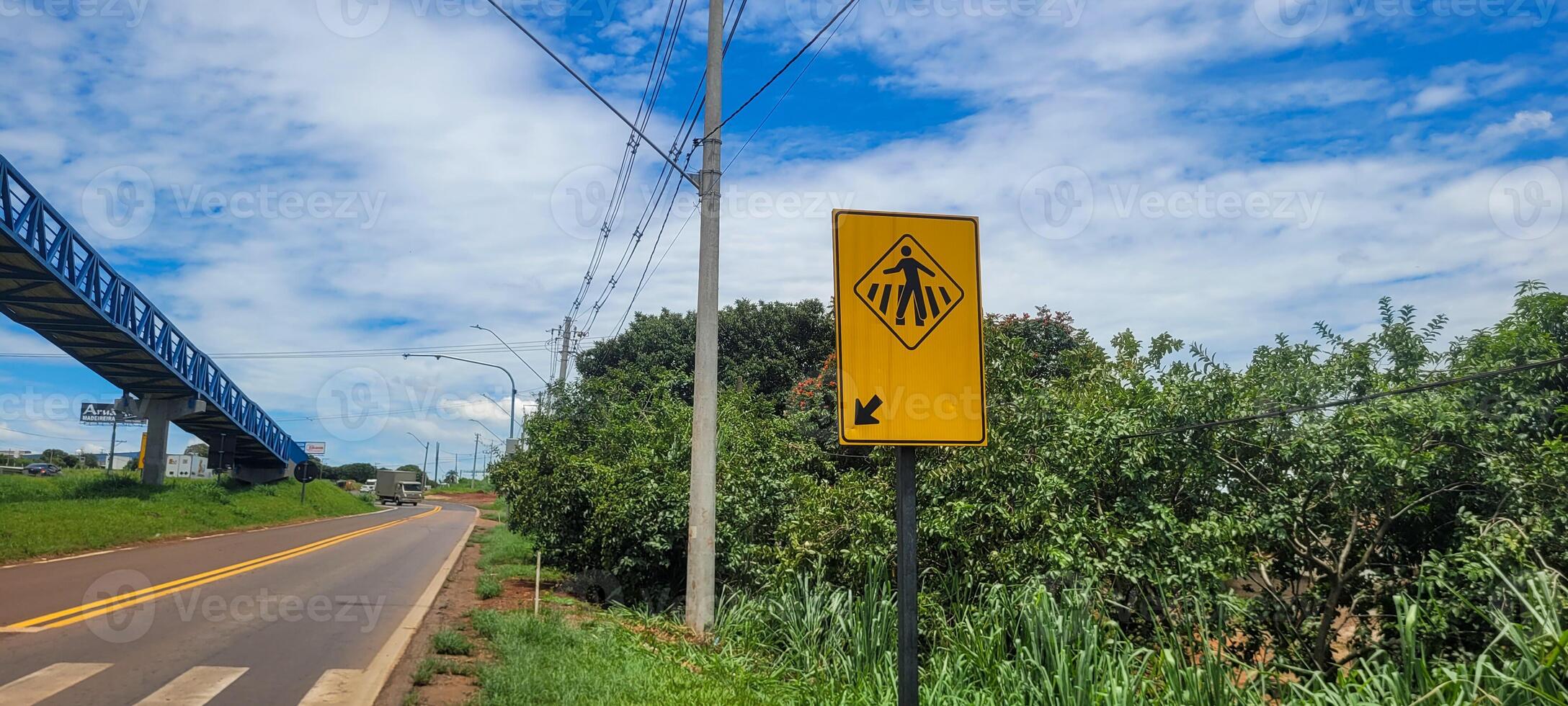 pedestrian sign on paved road photo