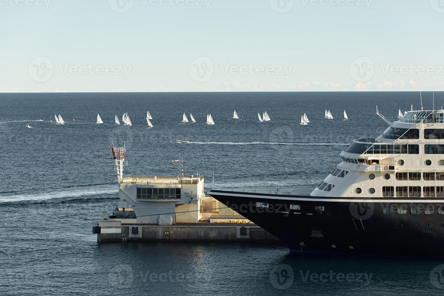 A lot of sail boats and yachts in the sea went on a sailing trip near port Hercules in Monaco, Monte Carlo, sail regatta, race photo