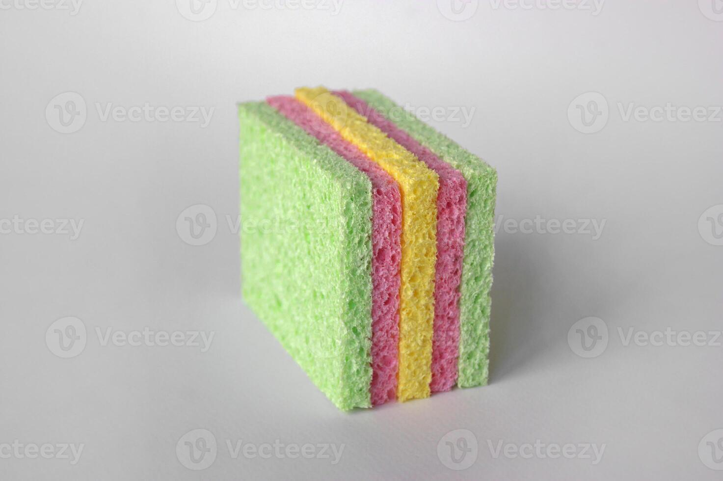 Bright colored sponges for washing dishes, cleaning the bathroom and other household needs. photo