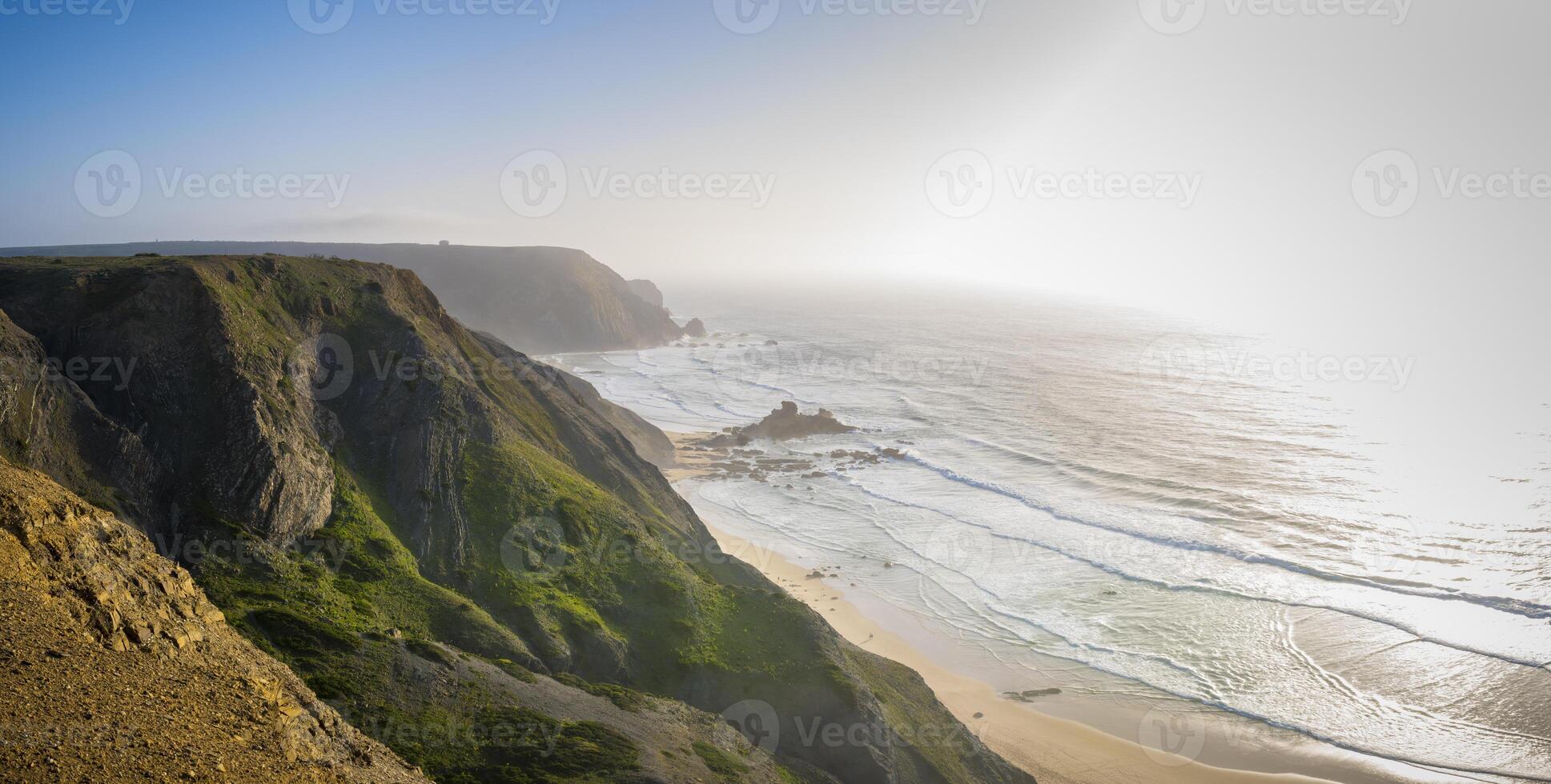 View of the dramatic coastline of Bordeira near Carrapateira on the costa Vicentina in the Algarve in Portugal photo