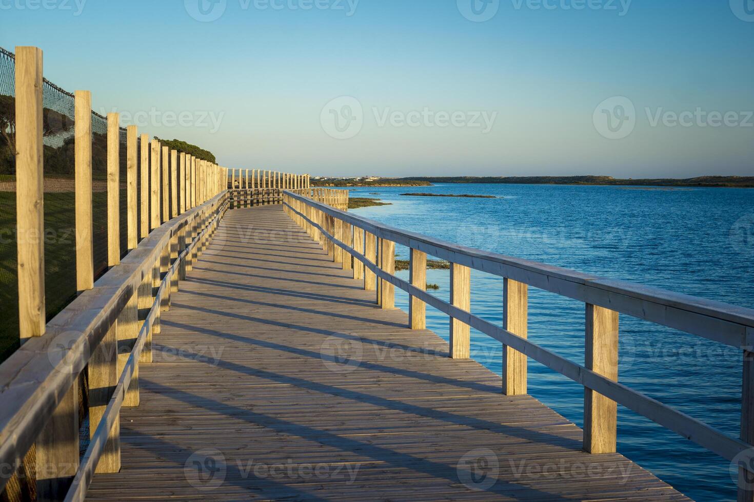 View on Rio Formosa wooden boardwalk near Faro in the Algarve, Portugal photo