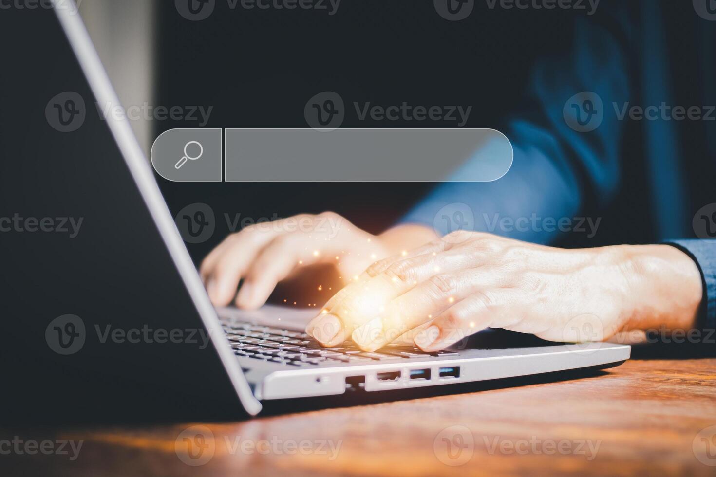 SEO Data Search Technology Search Engine Optimization. man's hands are using a computer laptop to find what they are interested in. Searching for information with your website. internet networking. photo