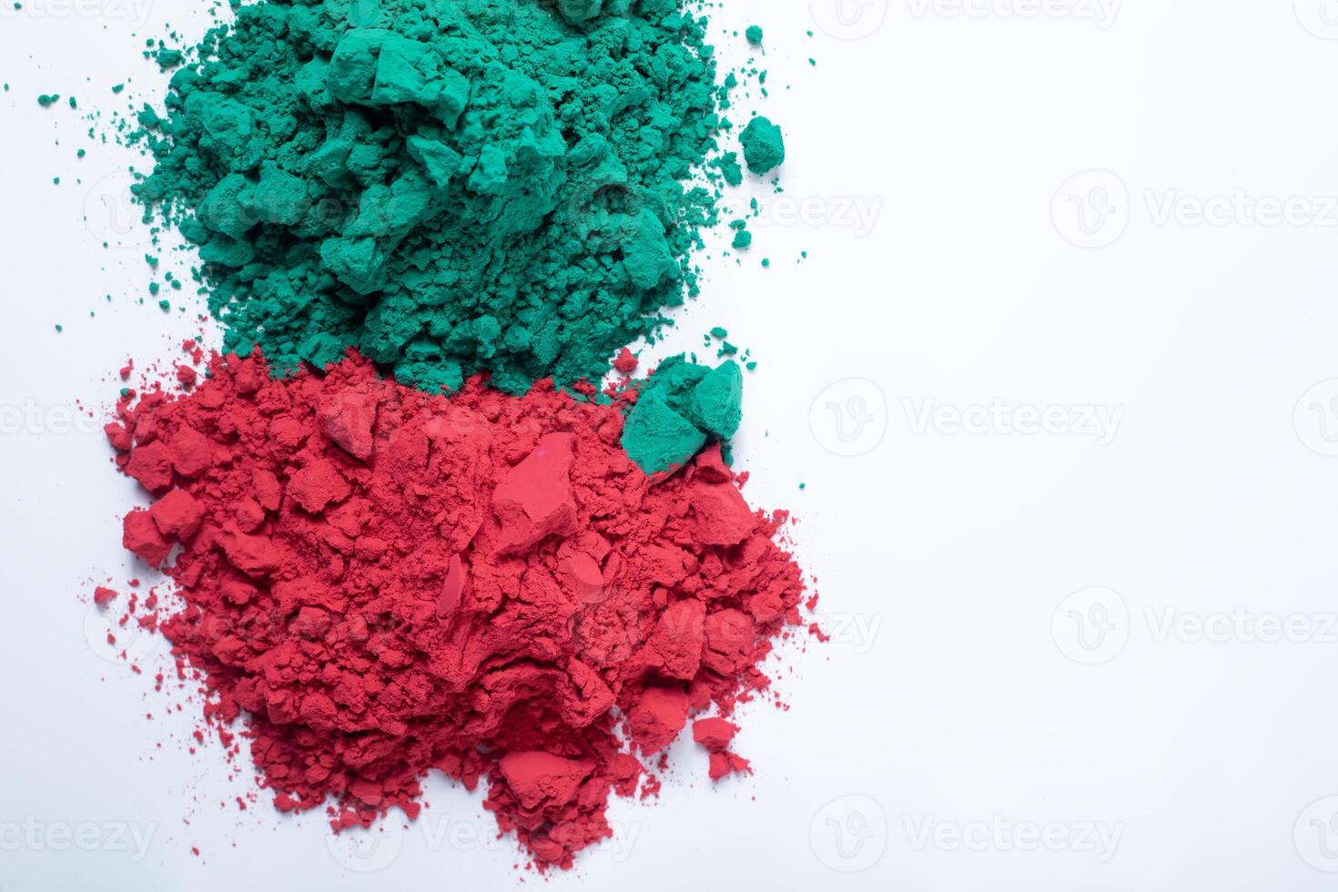 Pile of colorful holi powder isolated on white background. Closeup photo